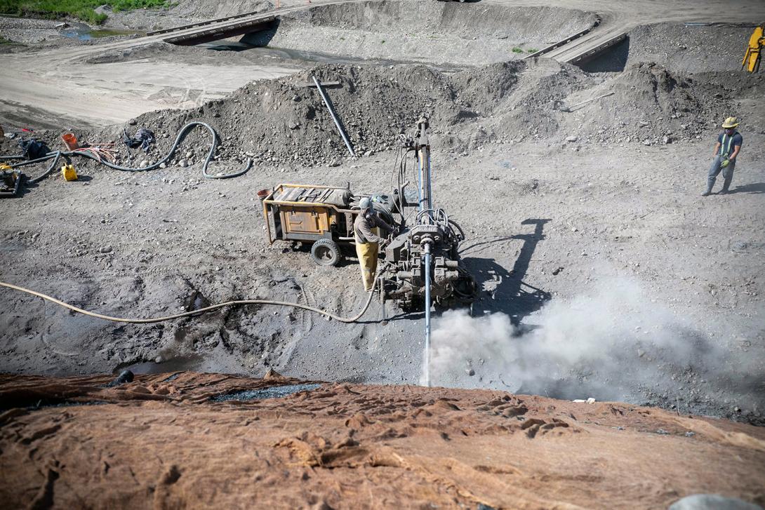 Drilling to install anchor bolts is underway at the 1.5-kilometre-long Highway 29 realignment segment at Dry Creek. | June 2021