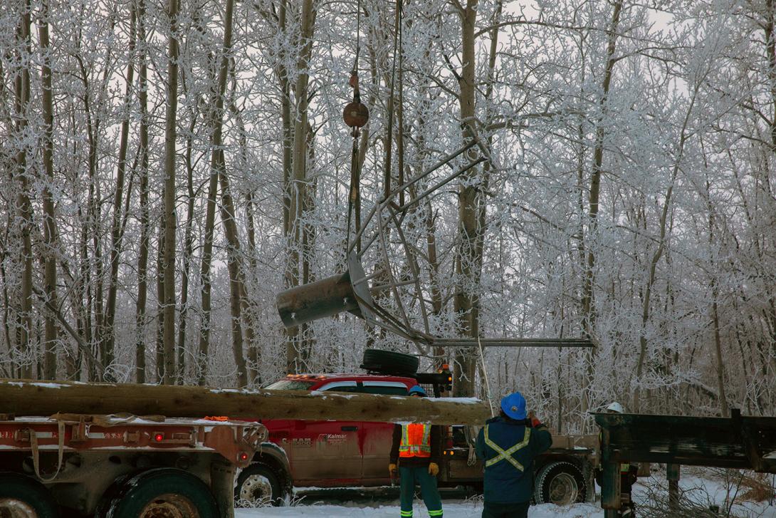 BC Hydro is constructing around 40 new eagle nesting platforms near the shoreline of the future Site C reservoir. The bald eagle nest structures are made with a steel basket that is attached to an 18-metre-long pole. | November 2020
