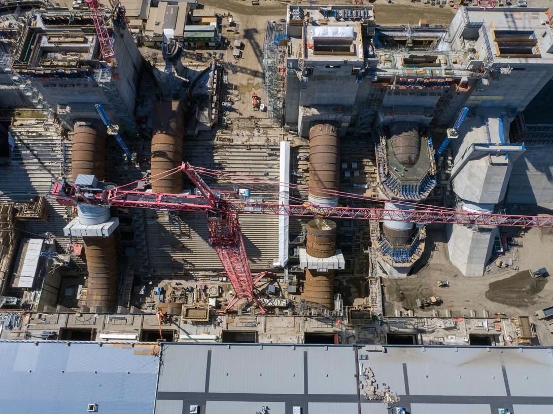 A top view (from right to left) of the unit 1 to 6 intakes and penstocks in varying stages of construction. Unit 4 is going to be the last to be built. | July 2021
