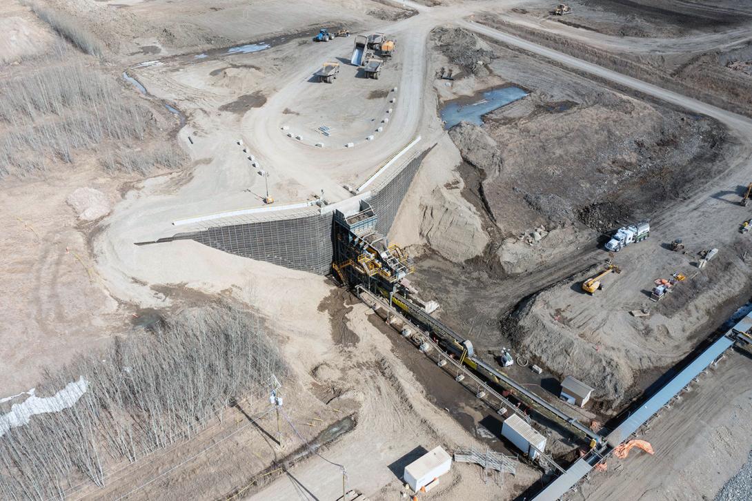 The hopper and feeder are the primary supply loading point for the conveyor that transports glacial till from the 85th Ave Industrial Lands to Site C. | April 2022