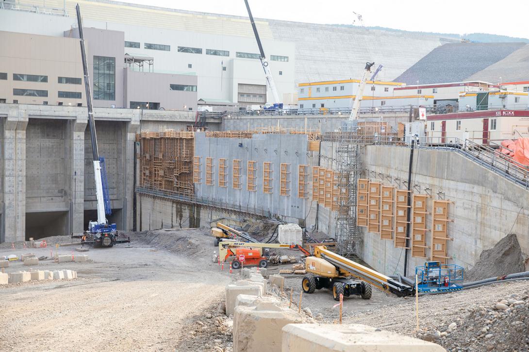 The baffles on the exterior of the permanent upstream fish passage facility are a place for fish to rest in the current of the fast water leaving the generating station. These baffles also disturb the water to attract the fish. | July 2023