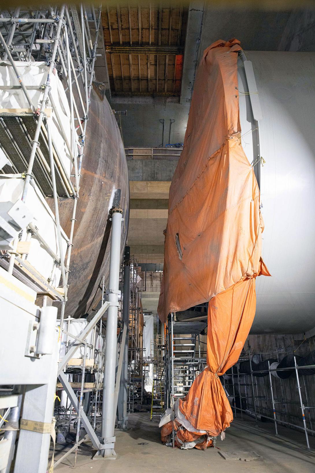 These two sections will be connected to allow water to flow from a penstock unit on the right into a turbine unit on the left. 