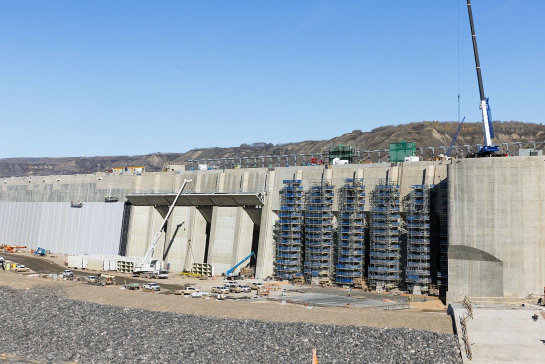There are six intakes at the top end of each penstock that carry water into the turbine runner units. The intakes are protected with trash racks to filter larger debris.