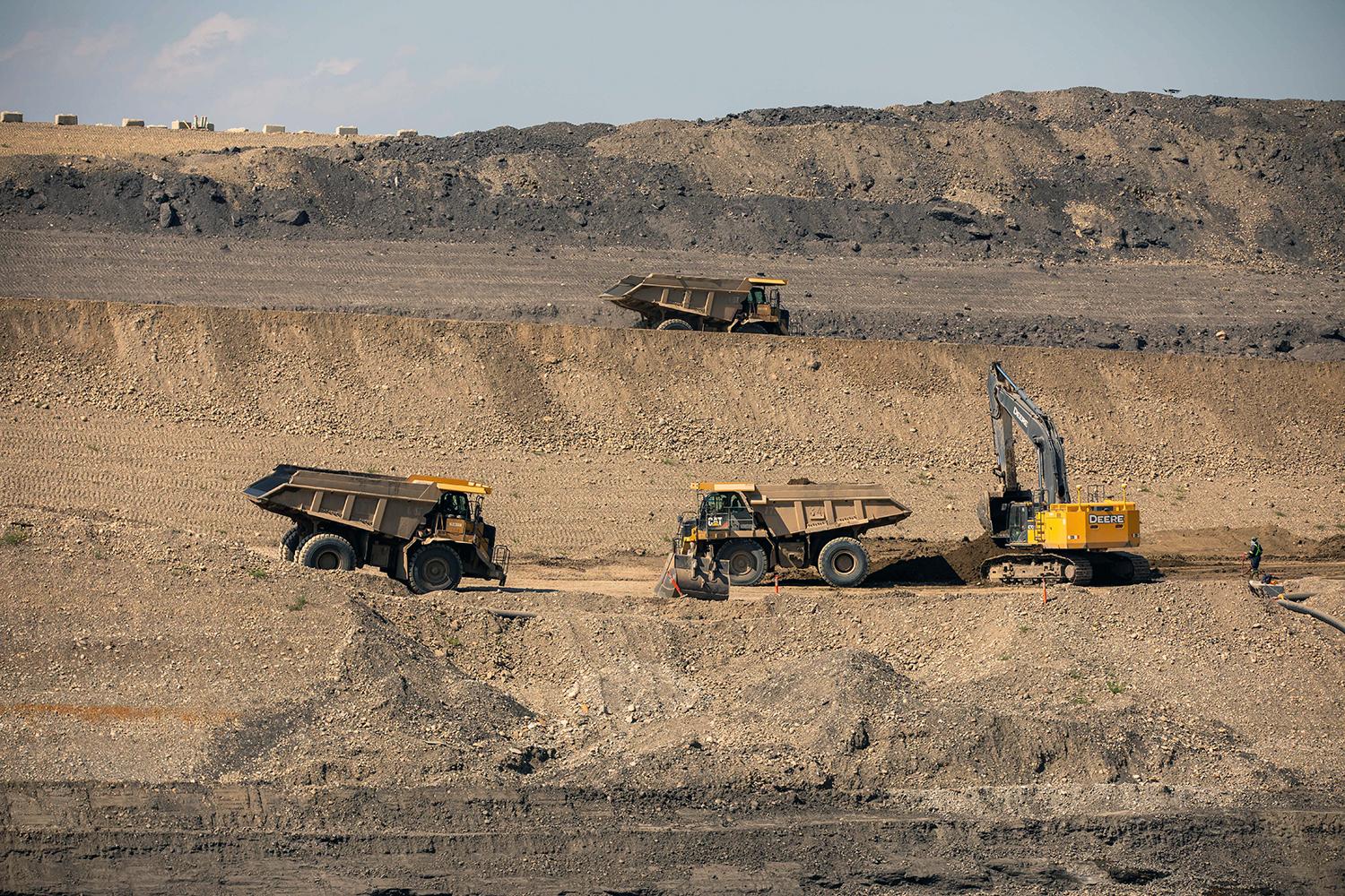 Material is removed from the upstream side of the dam core trench. | August 2021