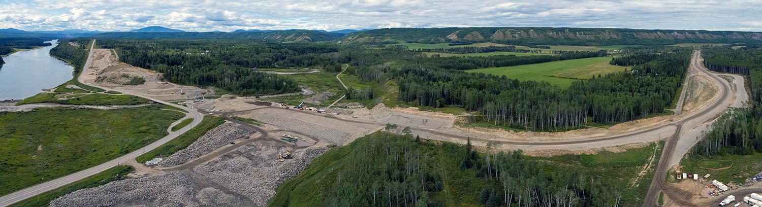 View of Lynx Creek bridge construction and rip-rap stockpile. | August 2021