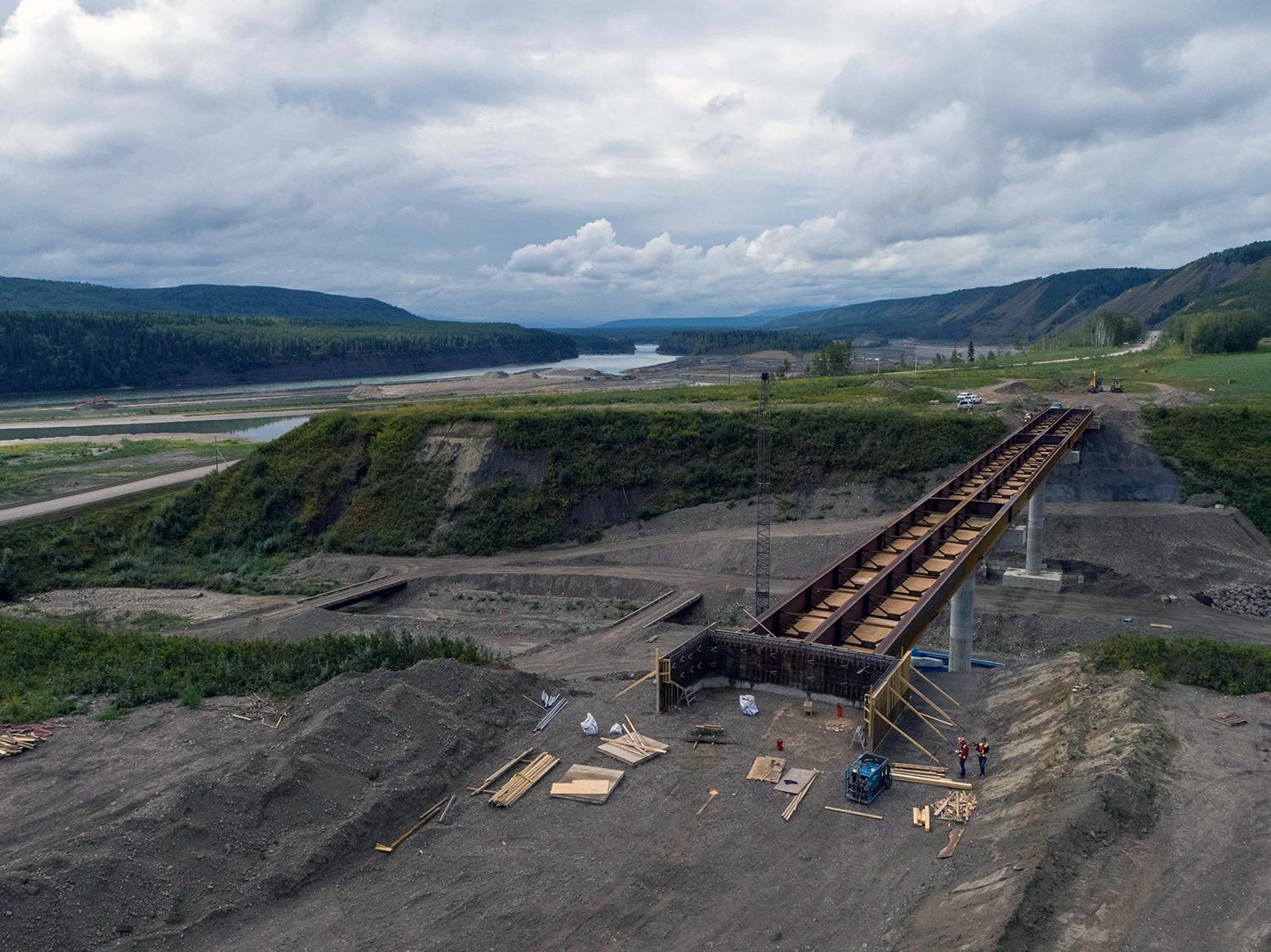 With the steel in place for the Dry Creek Highway 29 realignment, the next step is to install the precast concrete deck sections. | August 2021