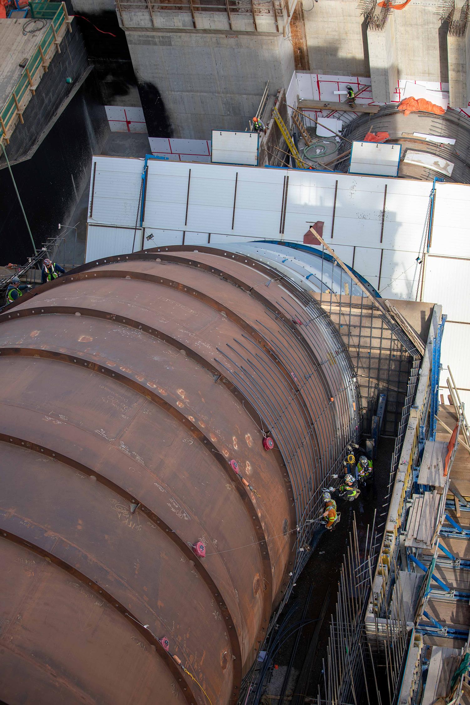 Installing reinforcing steel on the upper elbow of penstock unit 3. | October 2021