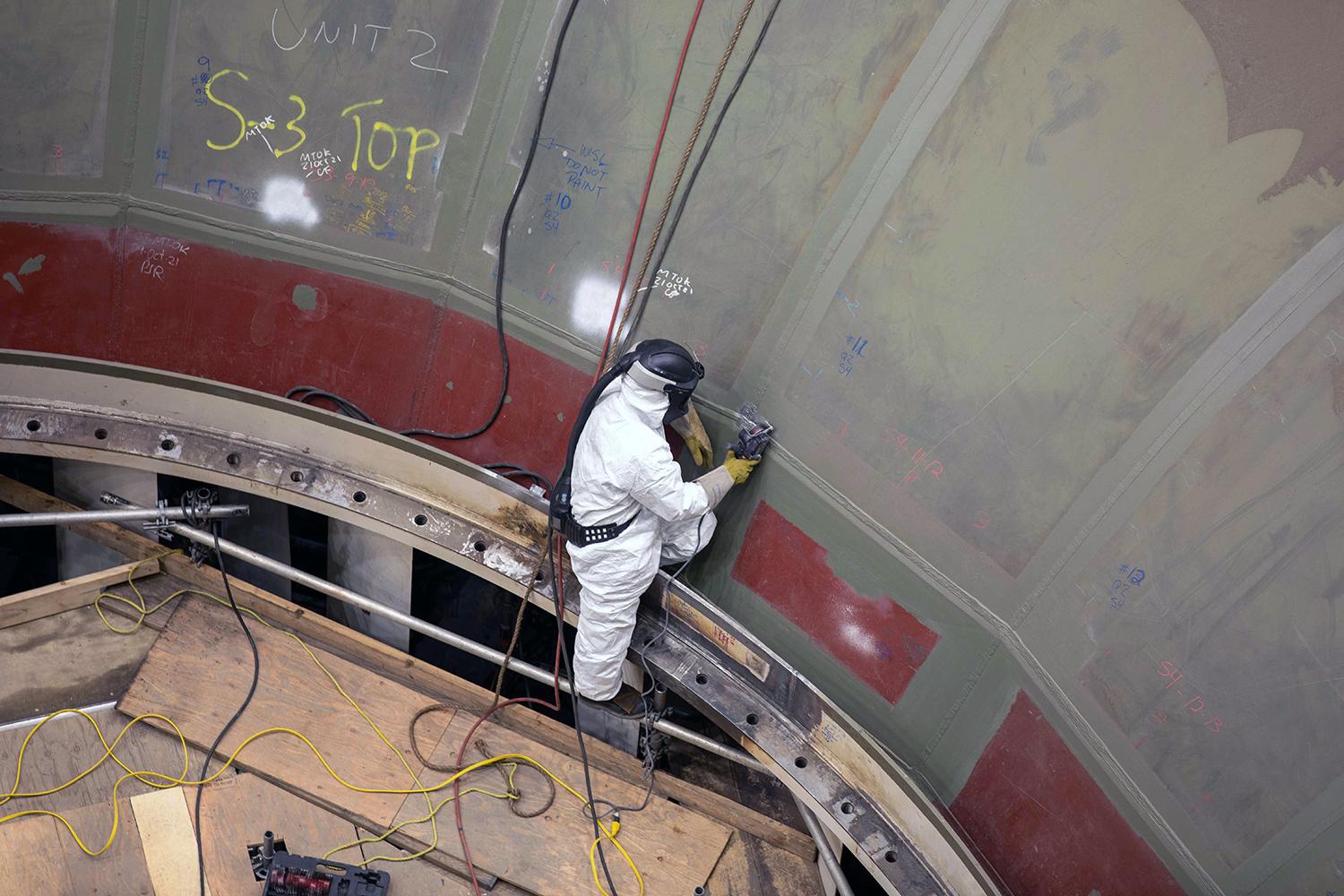 Using a bristle blaster to prepare and paint the surface of unit 2 spiral case. | October 2021 