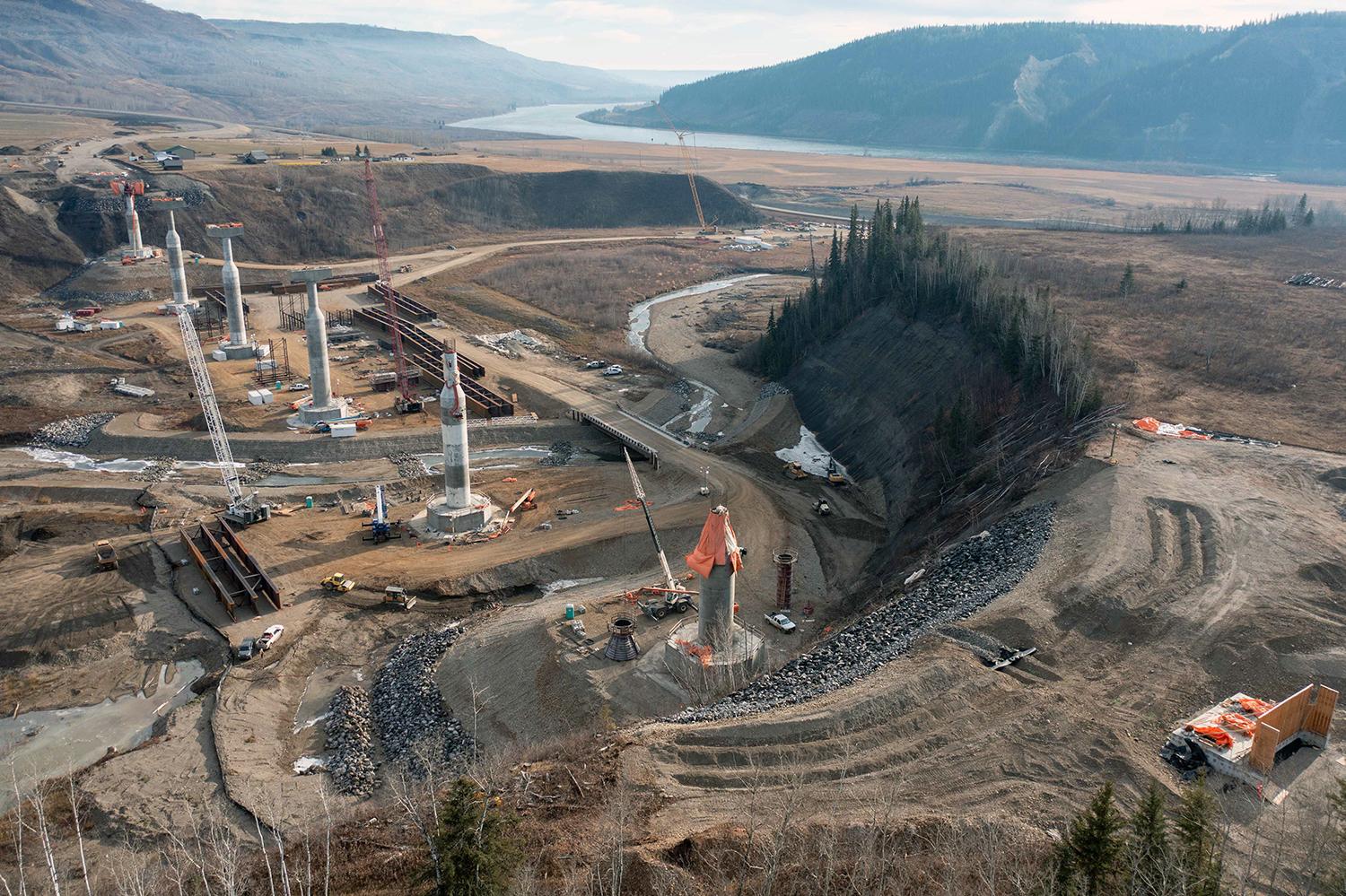 A pier is tarped to protect the transition cone on the Cache Creek bridge.  