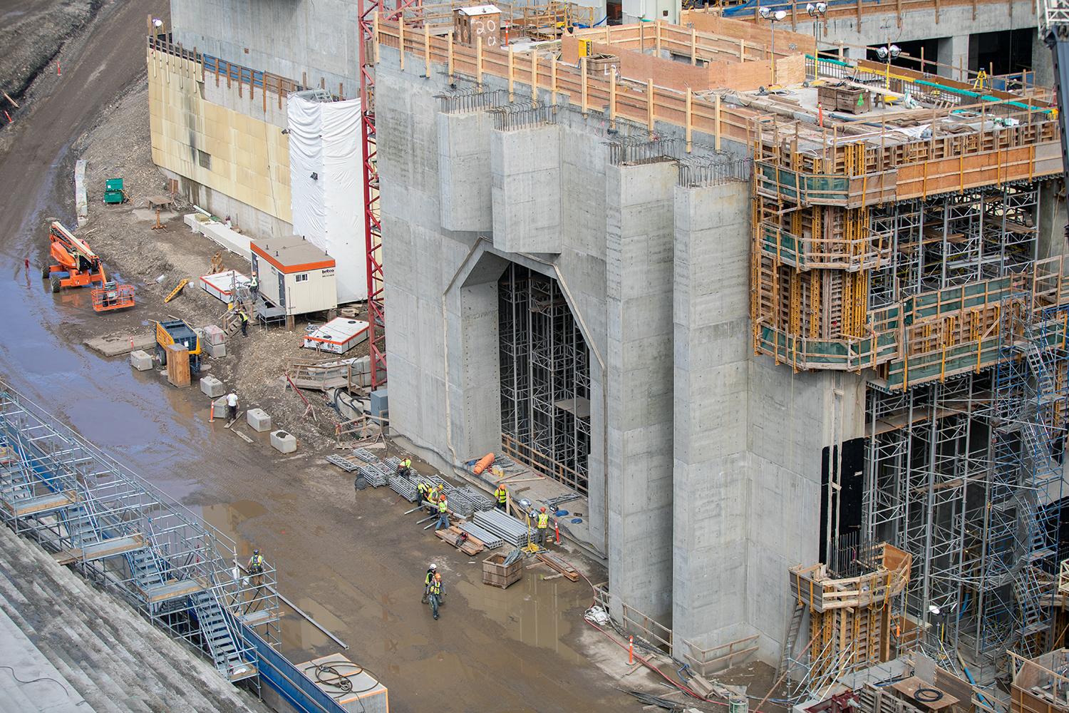 Construction of the unit 1 coupling chamber will connect the penstock to the turbine at the base of the powerhouse. | August 2019