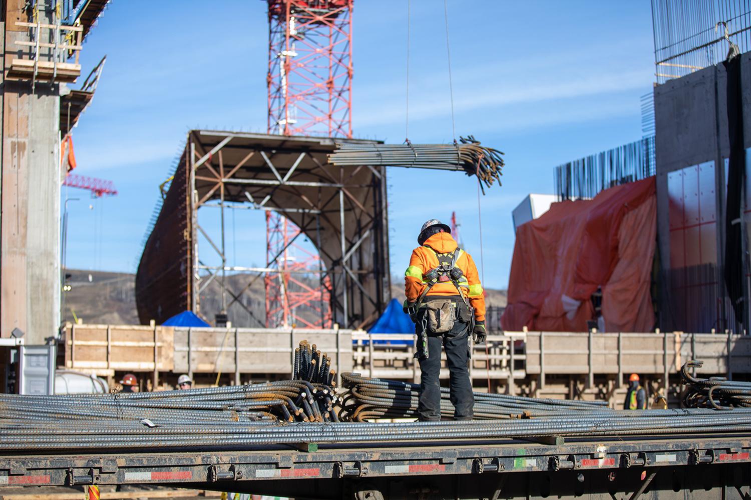 Rebar is being delivered at the intake area where it will be used to reinforce the concrete intake structures. More than 5,000 tons of rebar will be installed in the six intake structures. | October 2019