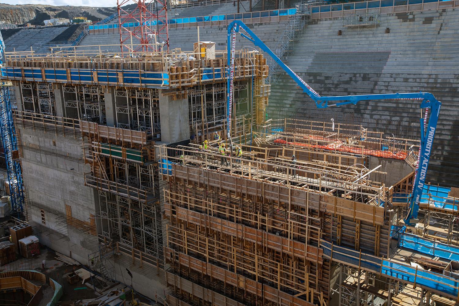The blue arm is a concrete-placing boom used for pouring concrete into the coupling chamber of generating unit 2. | September 2019