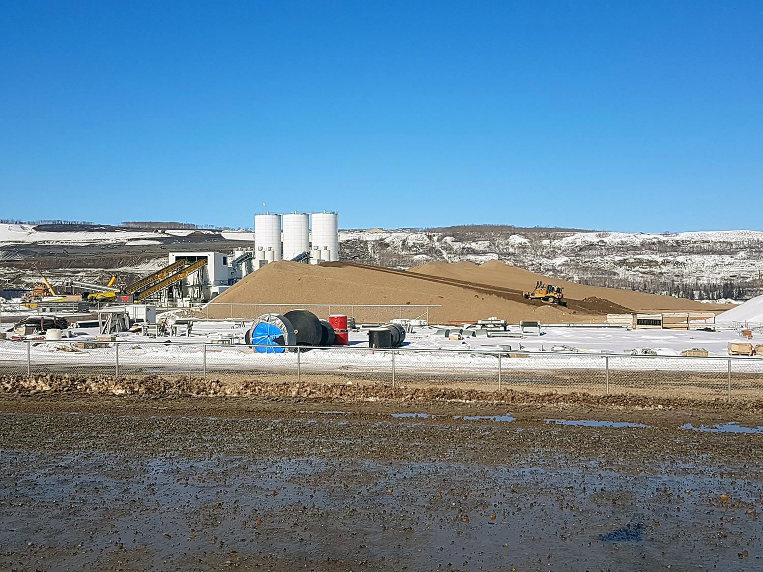 Concrete batch plants and aggregate stockpile on the south bank | April 2018 