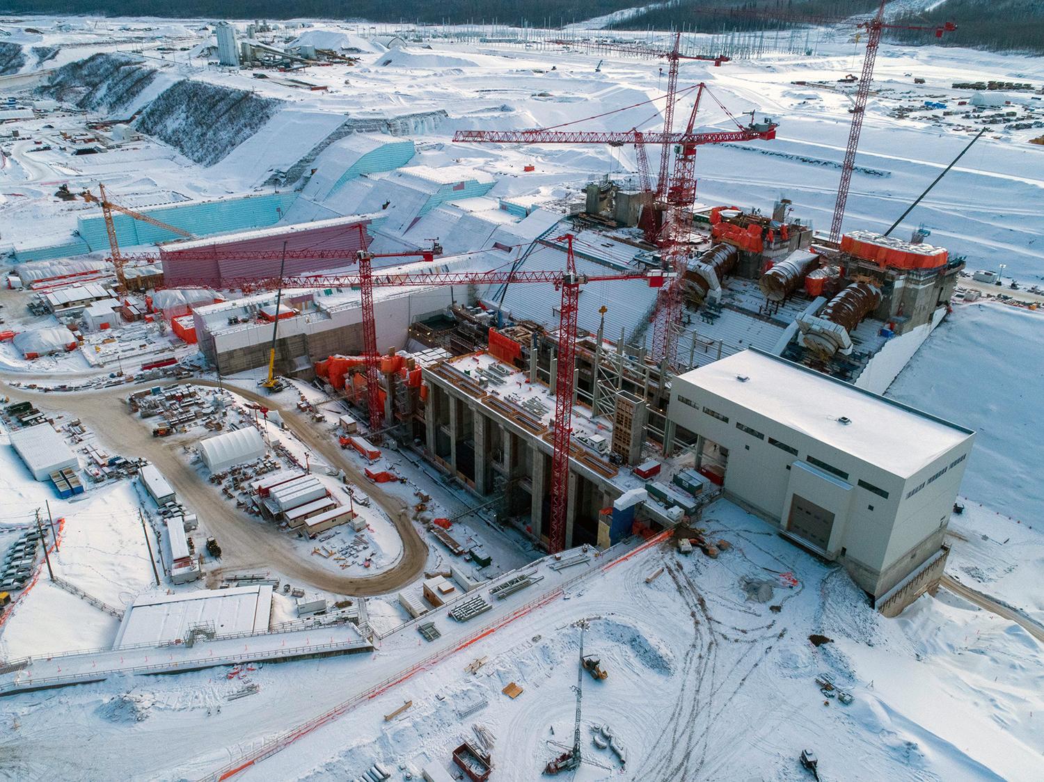 An aerial view of powerhouse, generating station and spillway construction. | February 2020