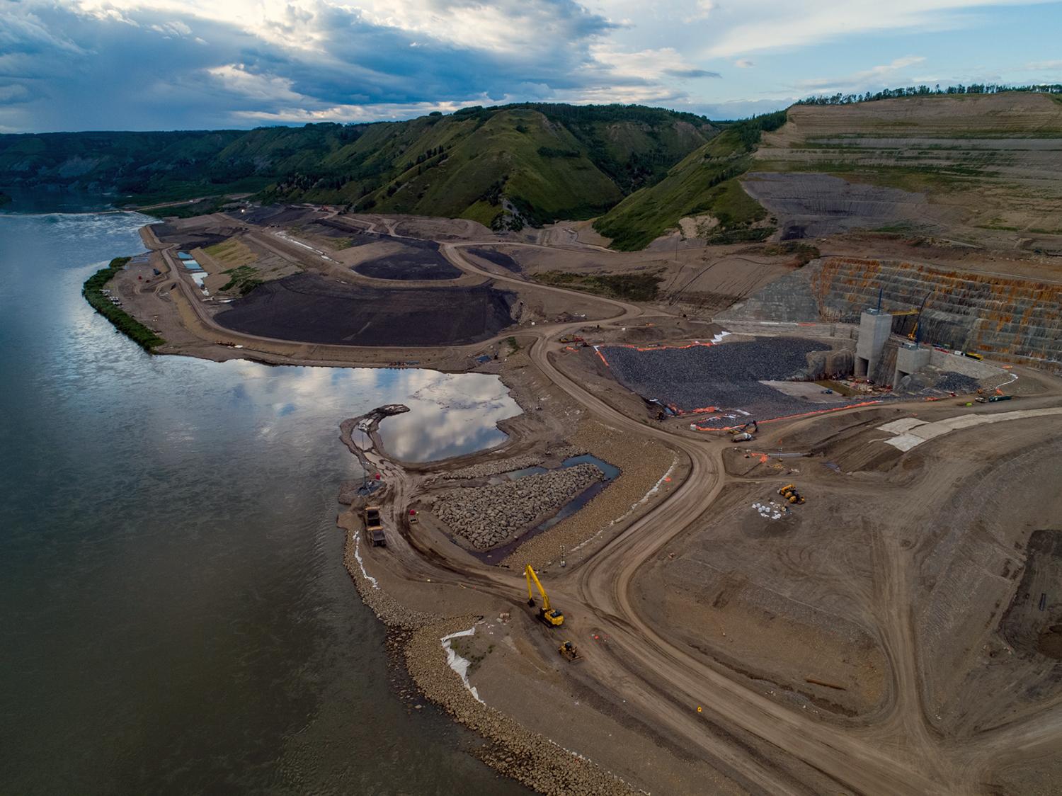 Overview of north bank showing the inlet portal channel and structures. | July 2020