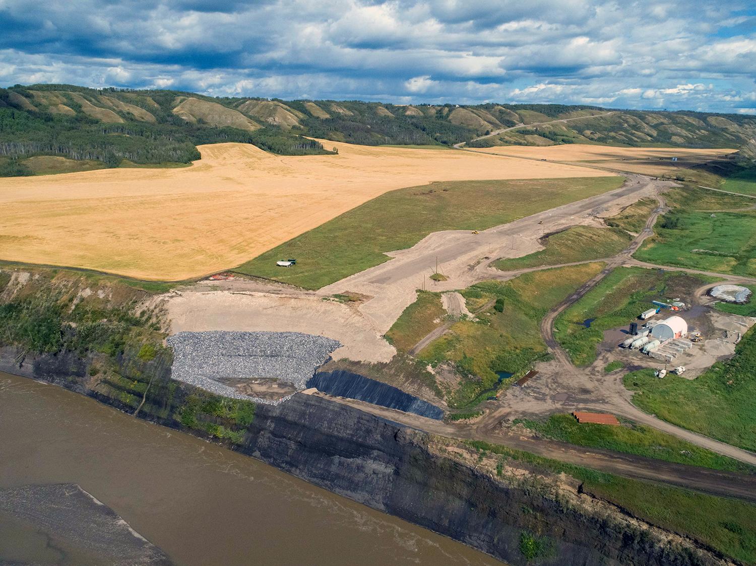 The highway approach on the east side of the new Halfway River bridge is under construction. | August 2020