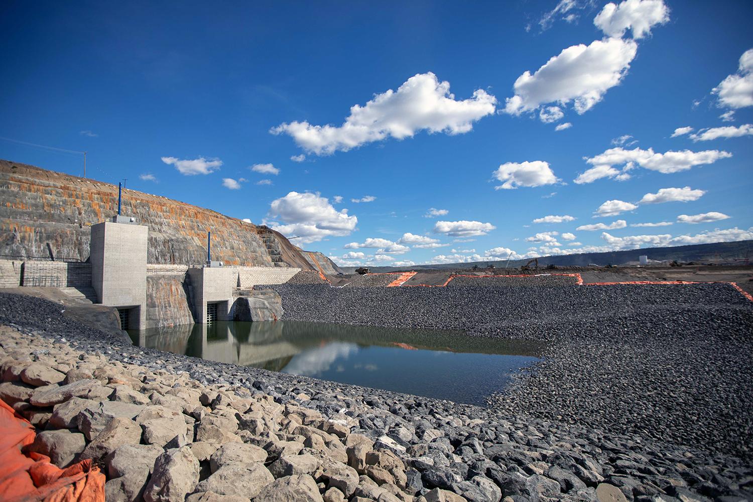 Filling the inlet cofferdam in preparation for the diversion tunnel gates leakage testing. | August 2020