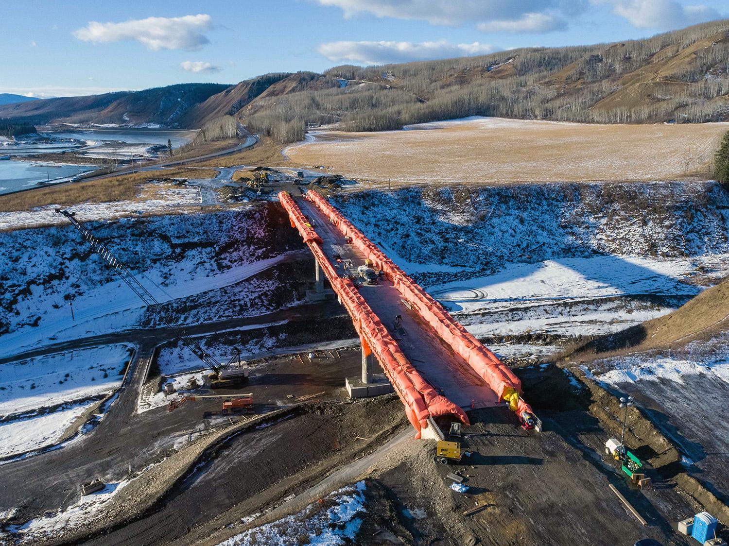 Wet curing and parapet heating, which will protect the surface of the Highway 29 Dry Creek bridge, is underway. | December 2021