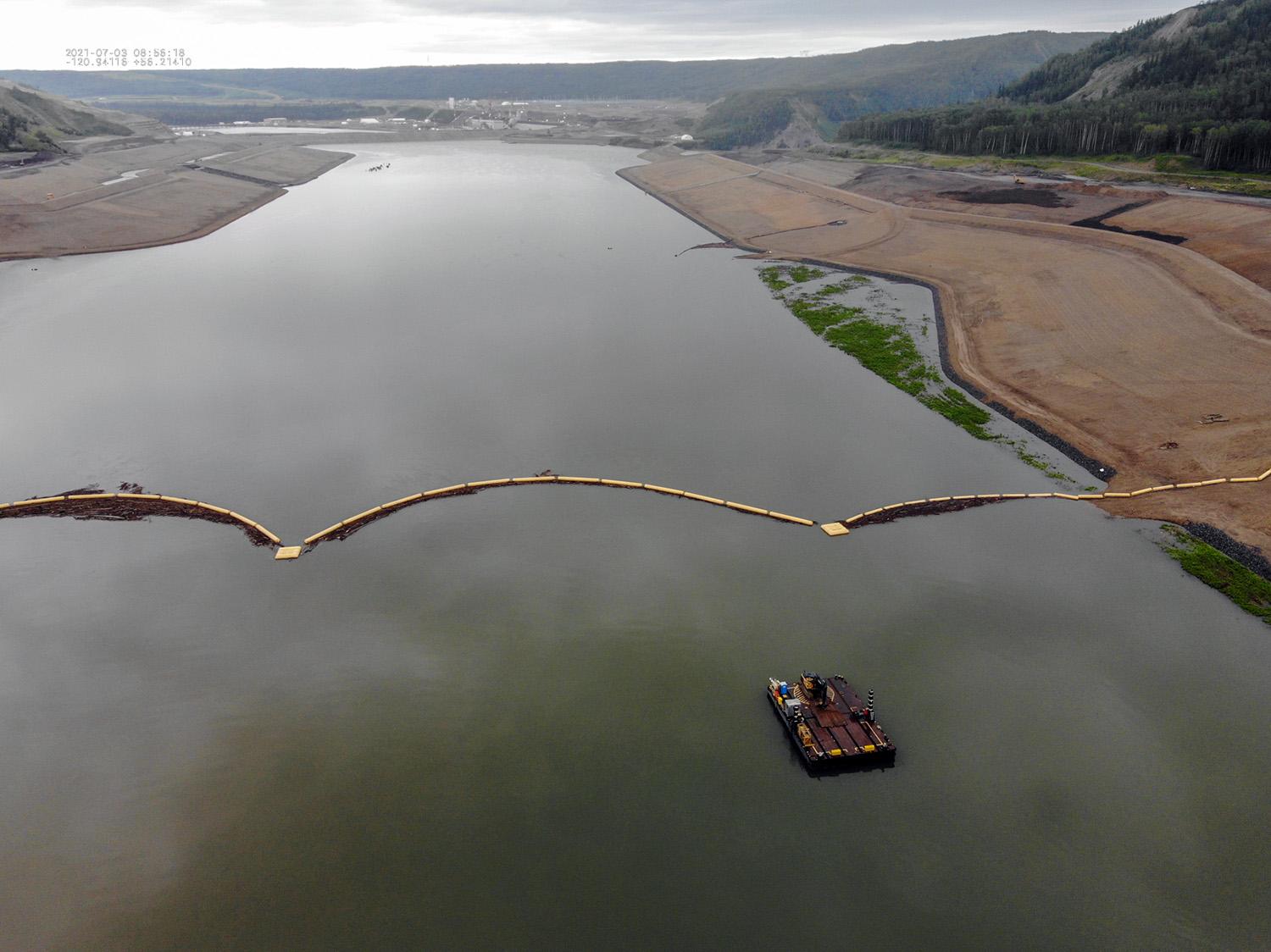 A top view (from right to left) of the unit 1 to 6 intakes and penstocks in varying stages of construction. Unit 4 is going to be the last to be built. | July 2021