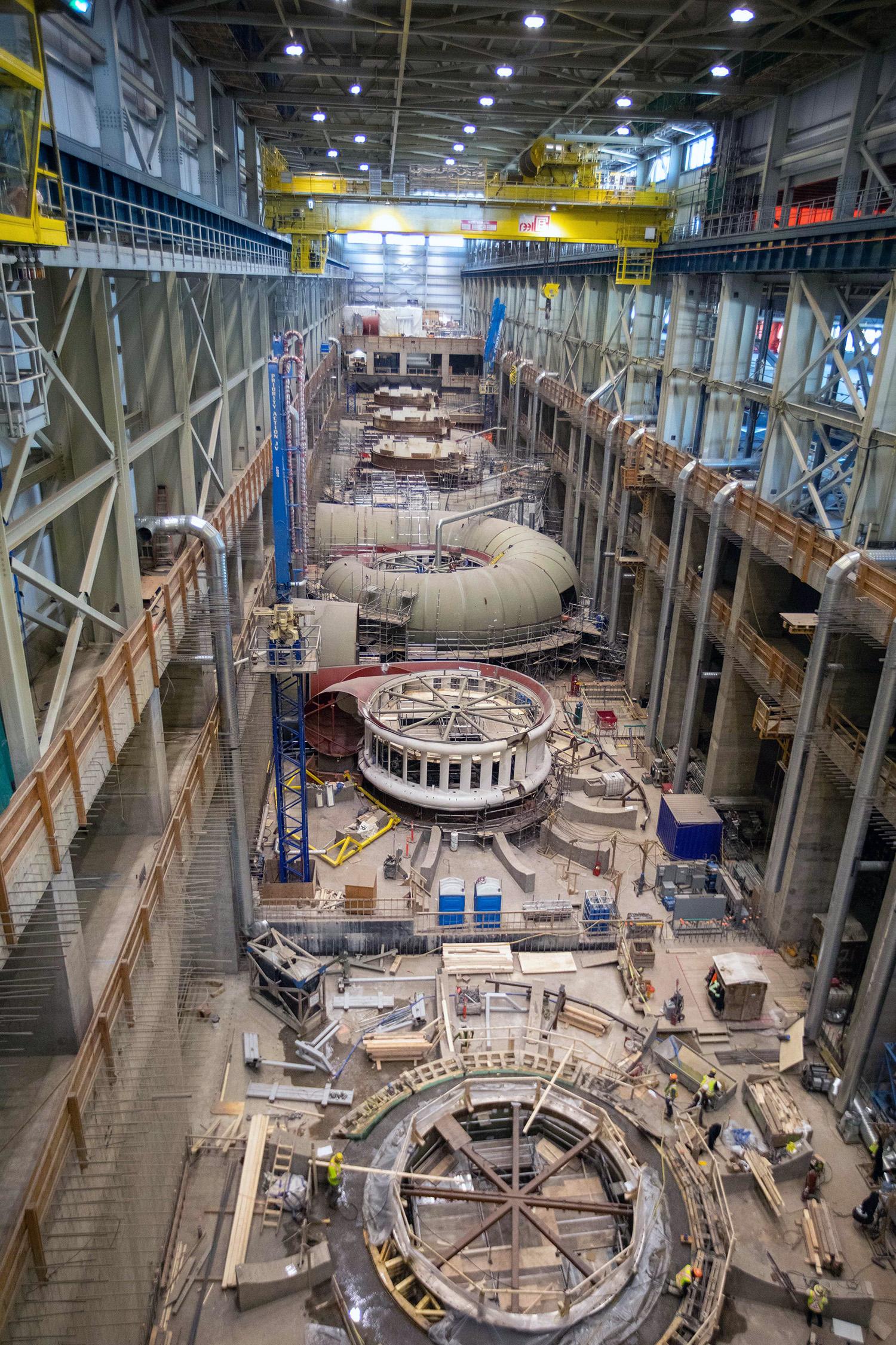 Preparing embedded piping for a second lift of concrete on spiral case unit 1. | February 2022