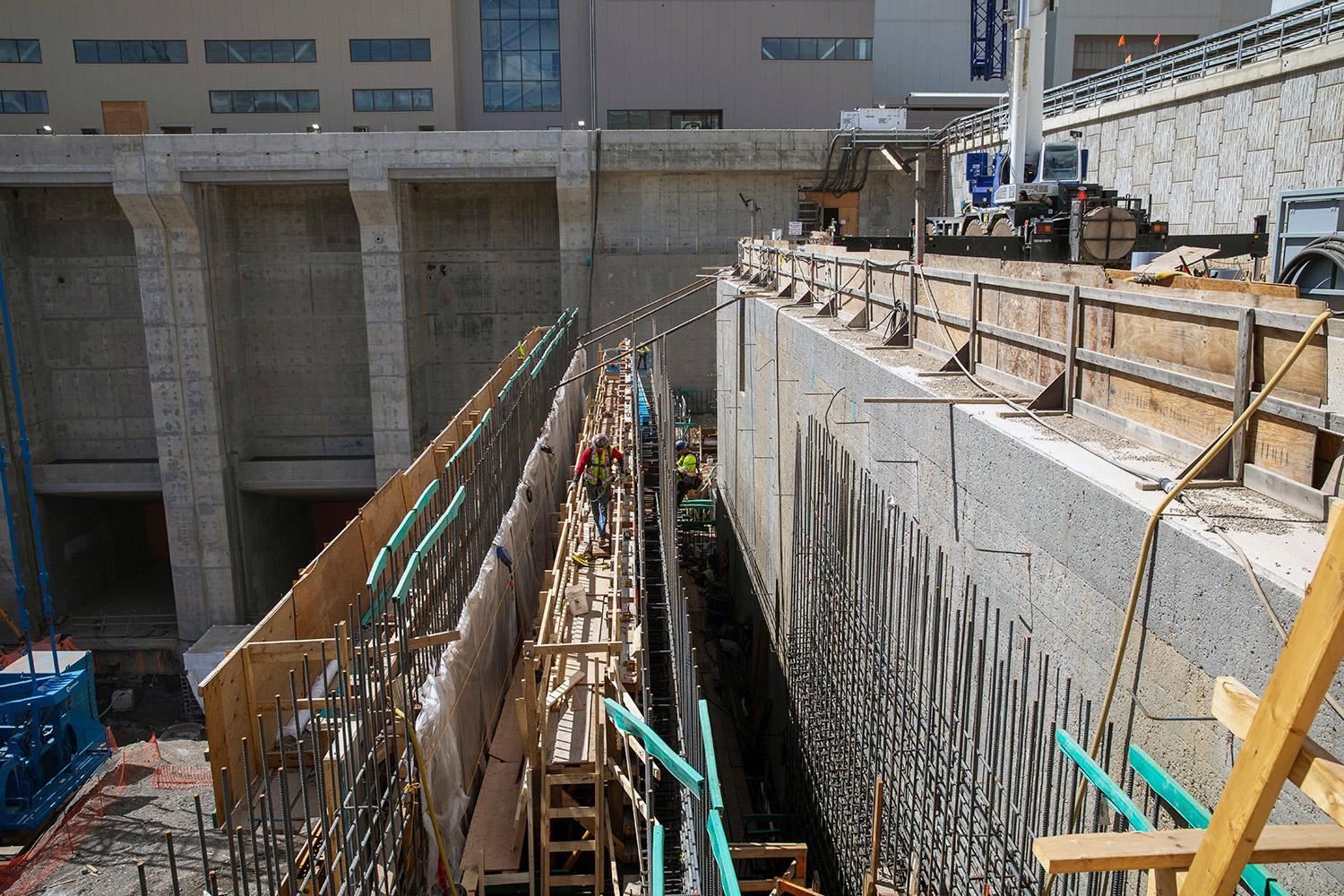 Workers install rebar at the permanent upstream fish passage. | July 2022