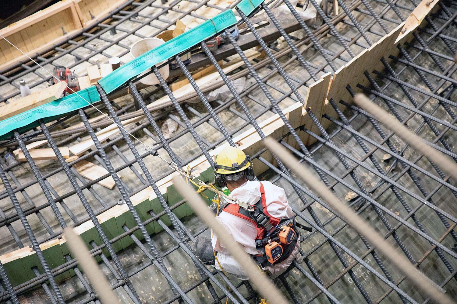 A worker prepares the Unit 3 spiral case for concrete placement. | September 2022