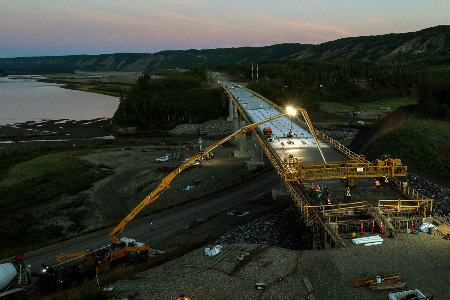 The final layer of concrete is poured on the Farrell Creek Bridge the night of August 16. | August 2022