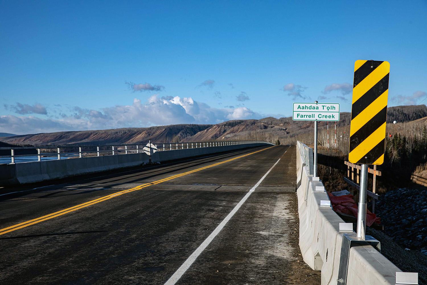 Farrell Creek Bridge with dual-language signage in Beaver and English. | October 2022