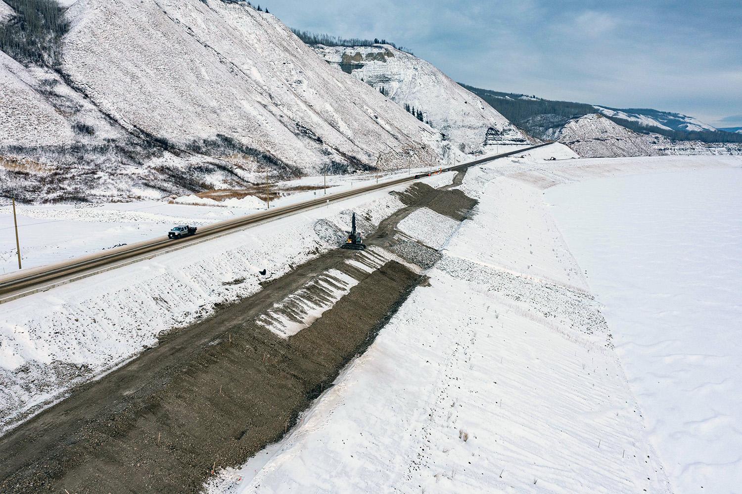 The Lynx Creek east embankment and newly-completed Highway 29 realignment seen at the left. | December 2022