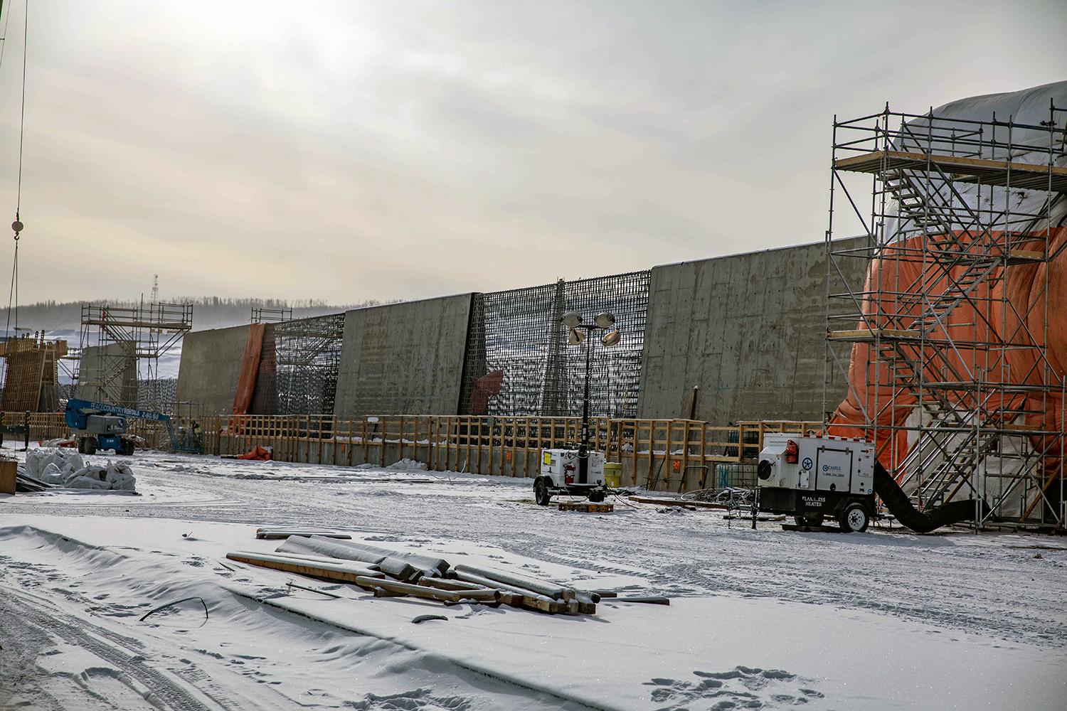 Installing rebar on the approach channel wall for pouring concrete. | March 2023