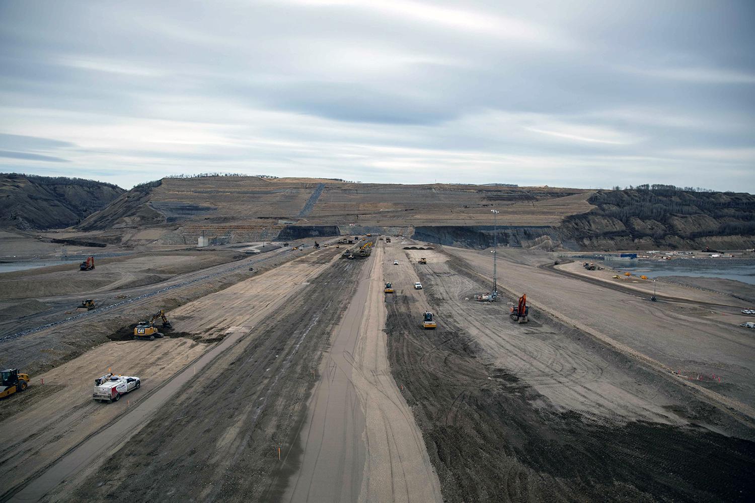 North-facing view across the earthfill dam. | April 2023