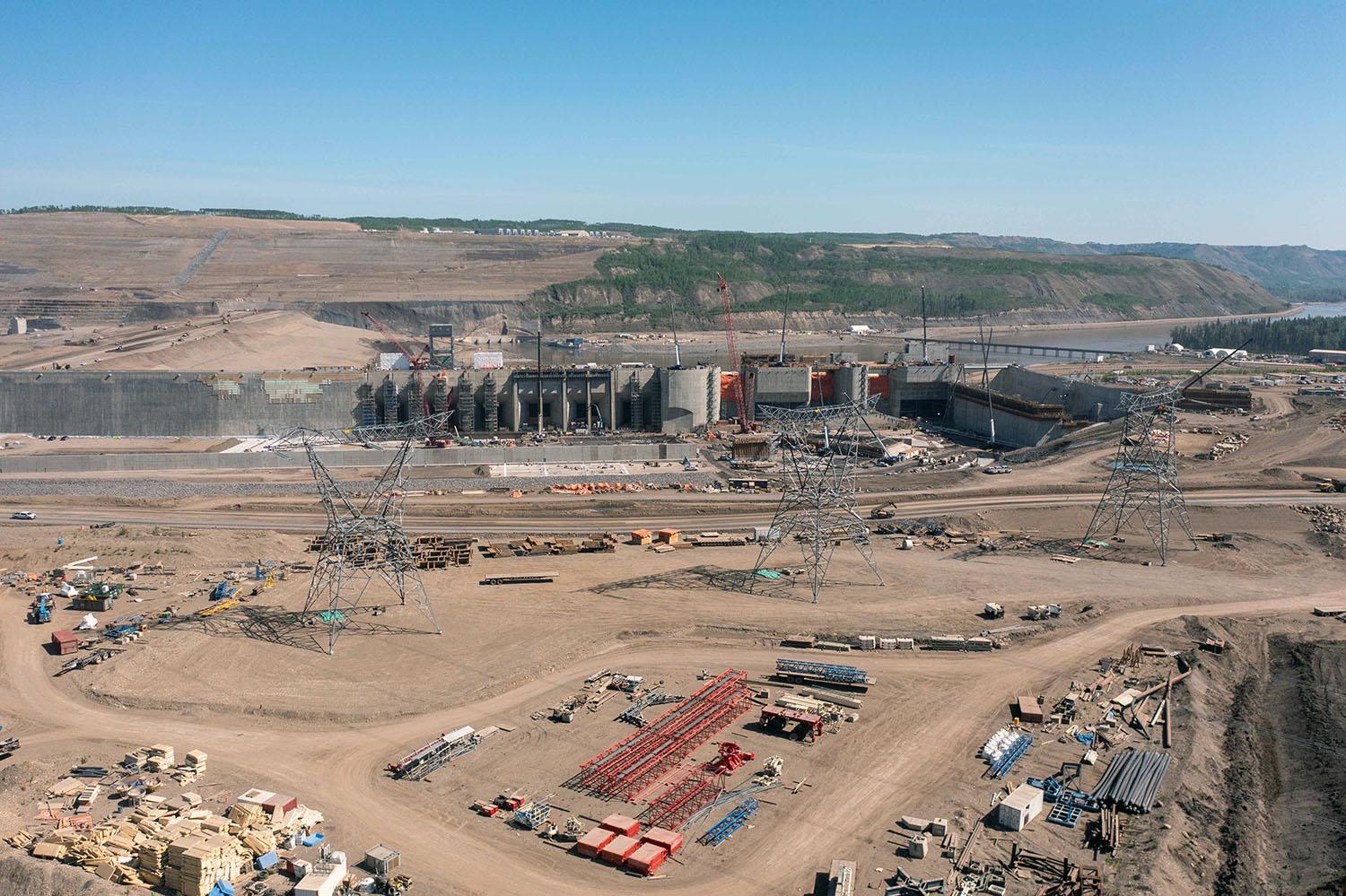 North-facing view of the three 500-kilovolt transmission towers that will connect to the dam to transport electricity into the BC Hydro transmission system. | May 2023