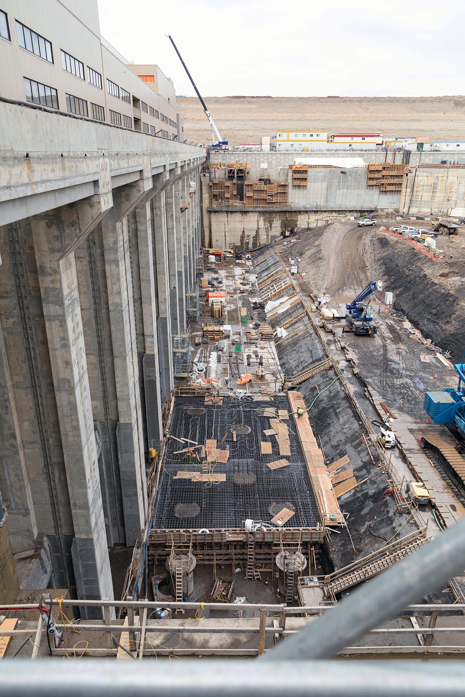 The tailrace is where the water exits the dam. The water has travelled from the reservoir through the approach channel into the intakes and down the penstocks into the six turbine runners to generate electricity. | May 2023