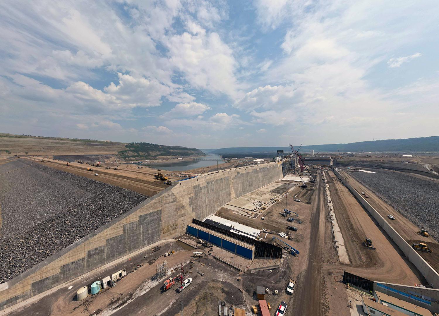 East-facing view up the approach channel where water will flow into the intakes from the reservoir. | June 2023