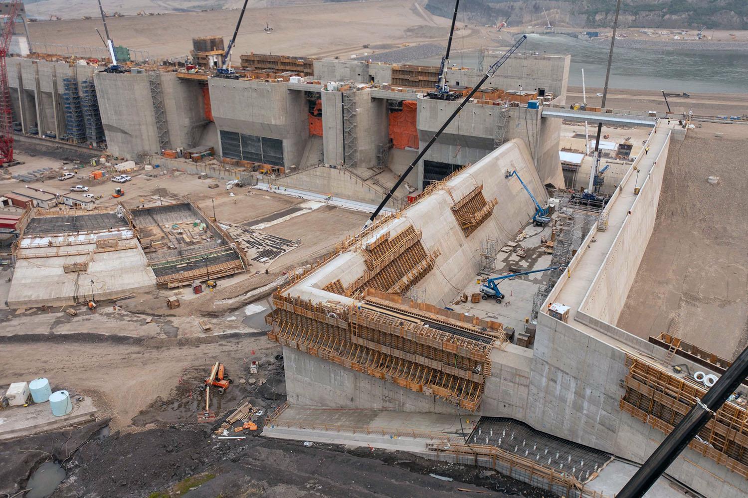 The auxiliary spillway safely handles overflow water.