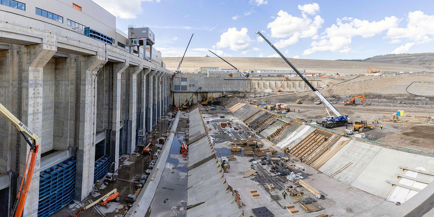 Formwork and reinforcing steel is placed on the erosion slabs in the tailrace. | August 2023