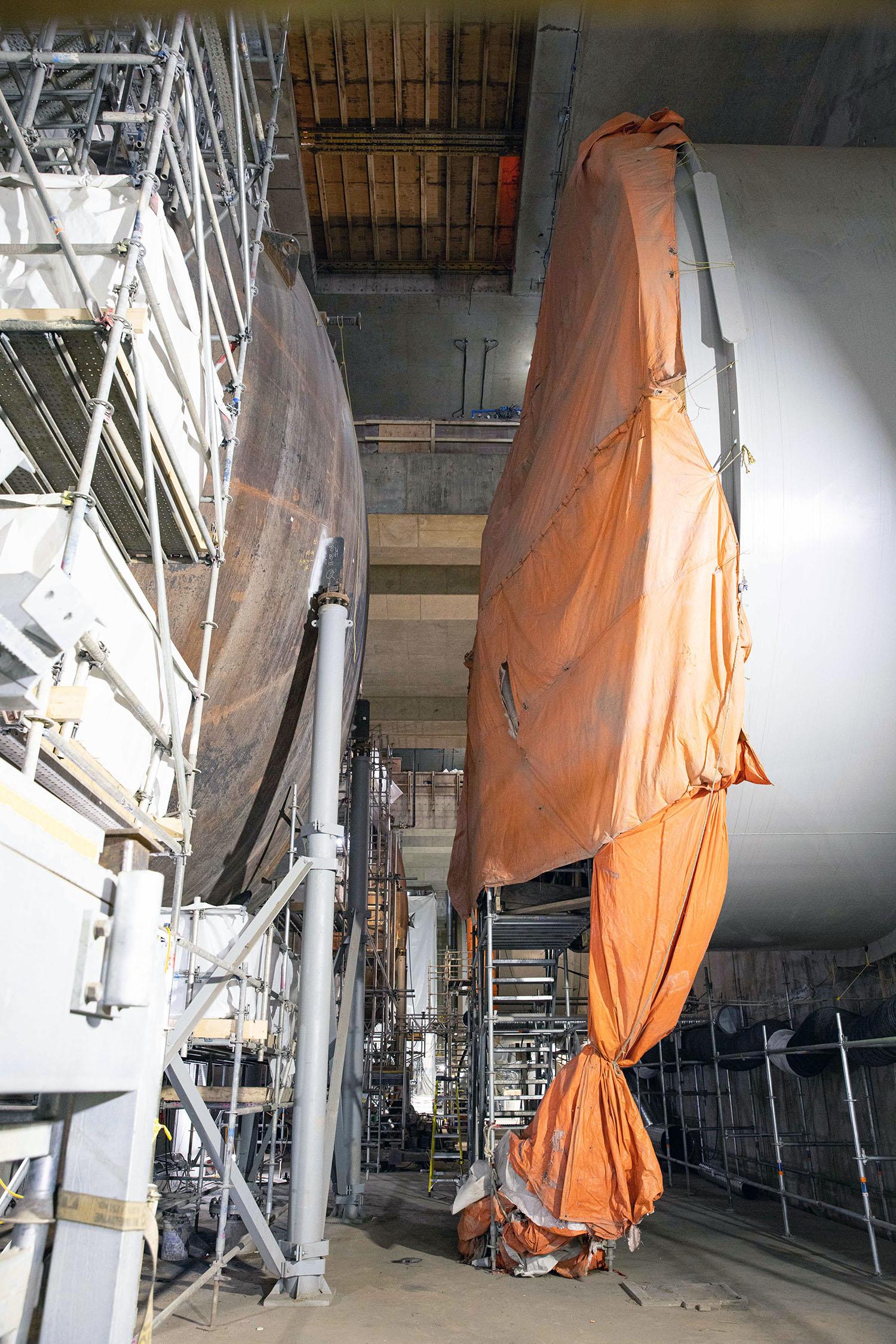 These two sections will be connected to allow water to flow from a penstock unit on the right into a turbine unit on the left. 