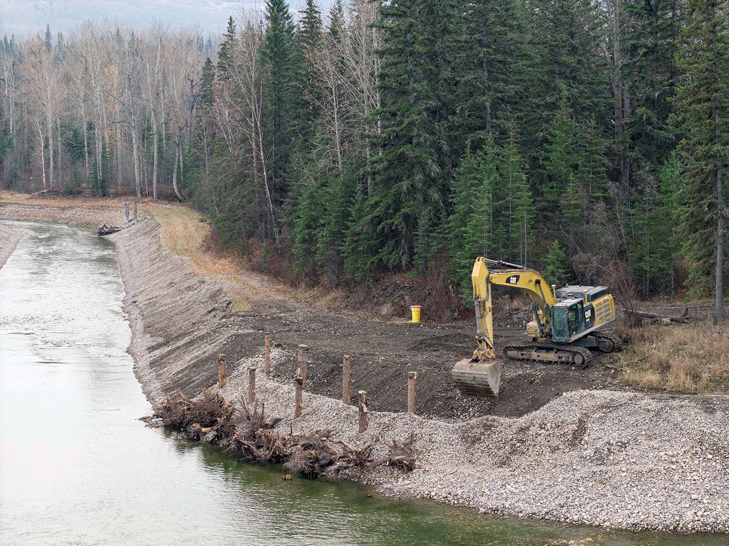 Final excavation and the placing large wooden structures will complete the fish habitat downstream of the dam. | November 2023