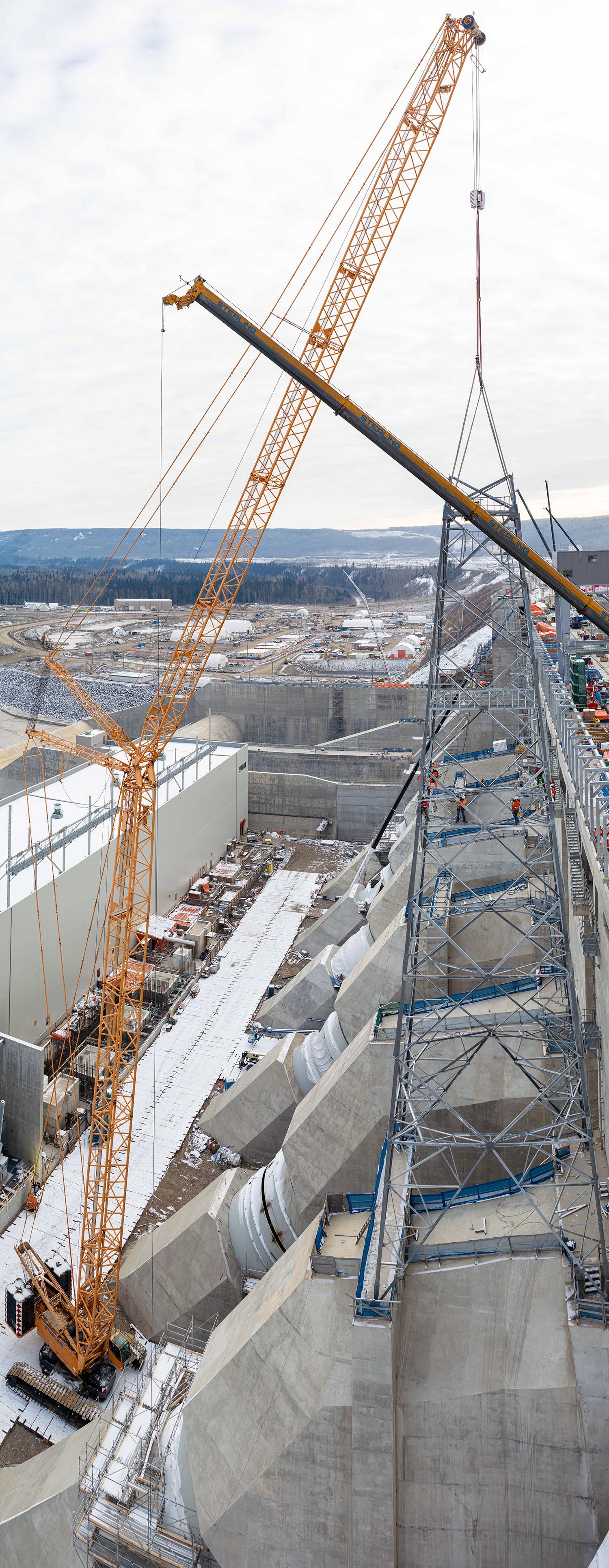 The third section of the transmission tower on unit 1 is connected to the lower sections.