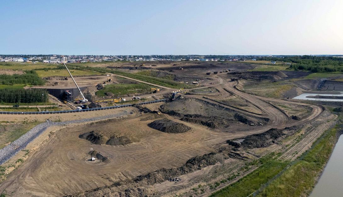Glacial till is extracted at the 85th Avenue Industrial Lands and sent by conveyor belt to the dam site. | August 2021