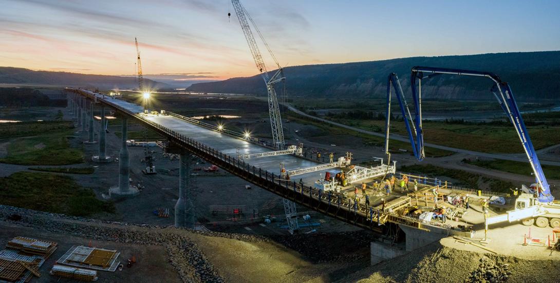 It took 2,300 cubic metres of concrete poured in 13 segments, to complete the deck of the Halfway River bridge. | August 2021