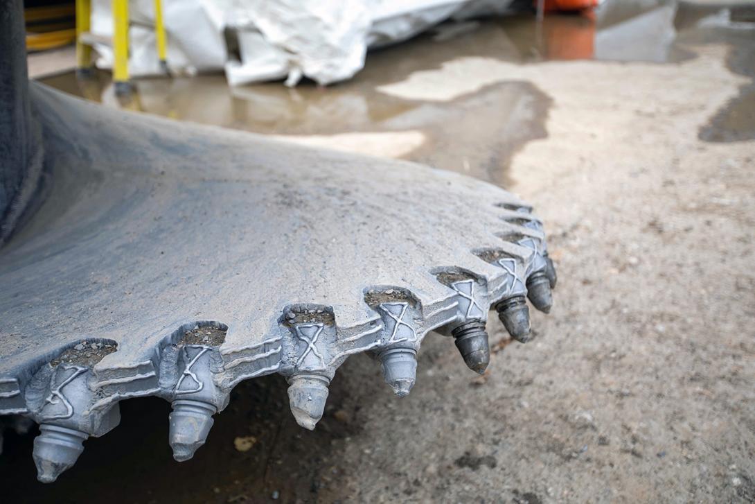 This auger drill, nicknamed “dragon’s teeth,” is used to drill holes for the right bank foundation enhancements. | October 2021