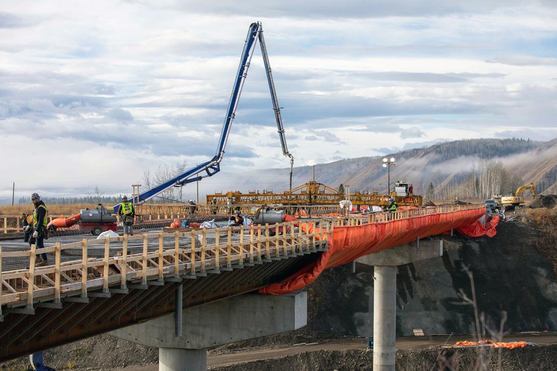 Crews place concrete on the Dry Creek bridge. | October 2021