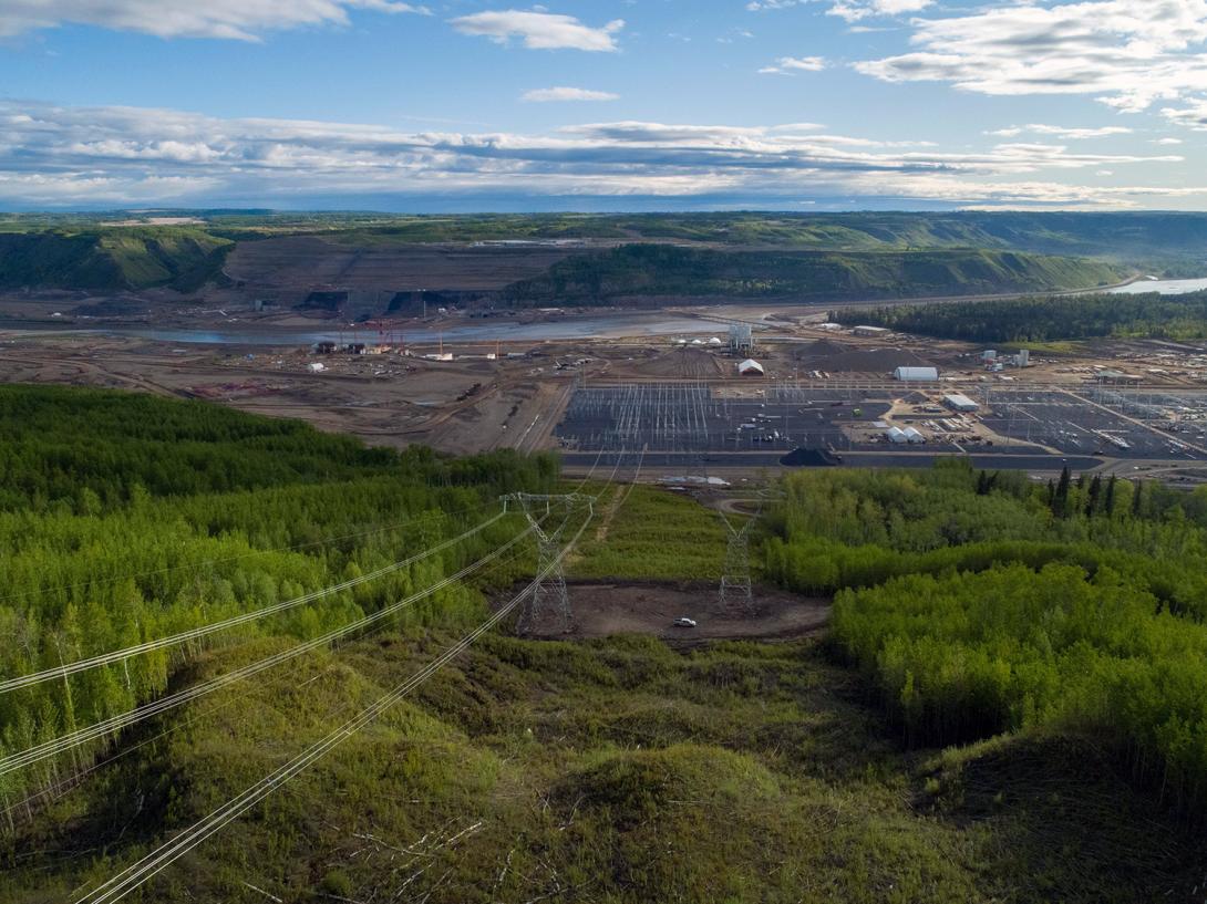 View of the Site C substation down the transmission line right-of-way with the completed tower installations. | May 2020