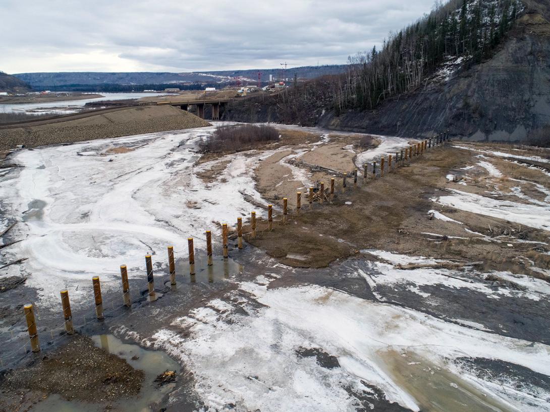 Looking east across the mouth of the Moberly River at the completed log debris boom structure. | April 2020 
