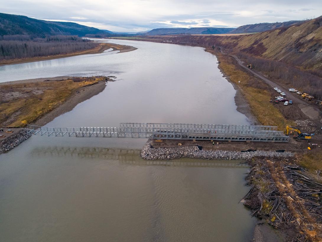 Launching of the super structure bridge off the causeway to an island, spanning the back channel of the Peace River. The bridge will be used for clearing equipment access. | October 2019