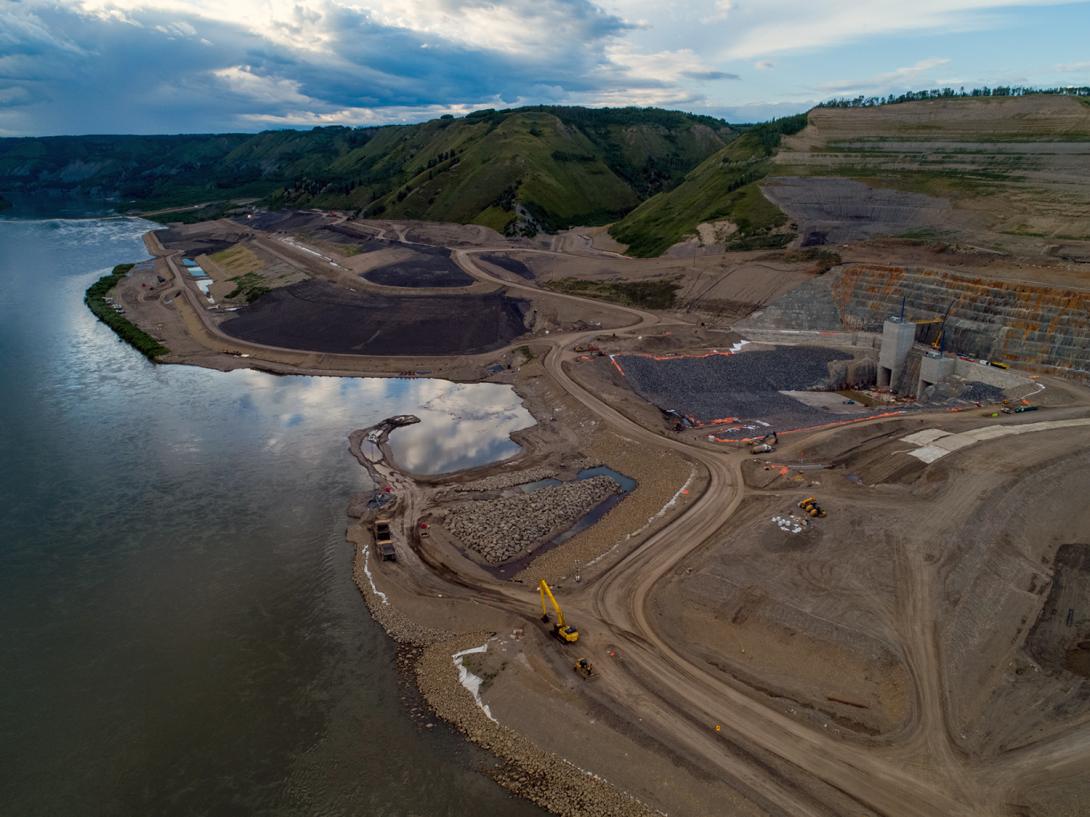 Overview of north bank showing the inlet portal channel and structures. | July 2020