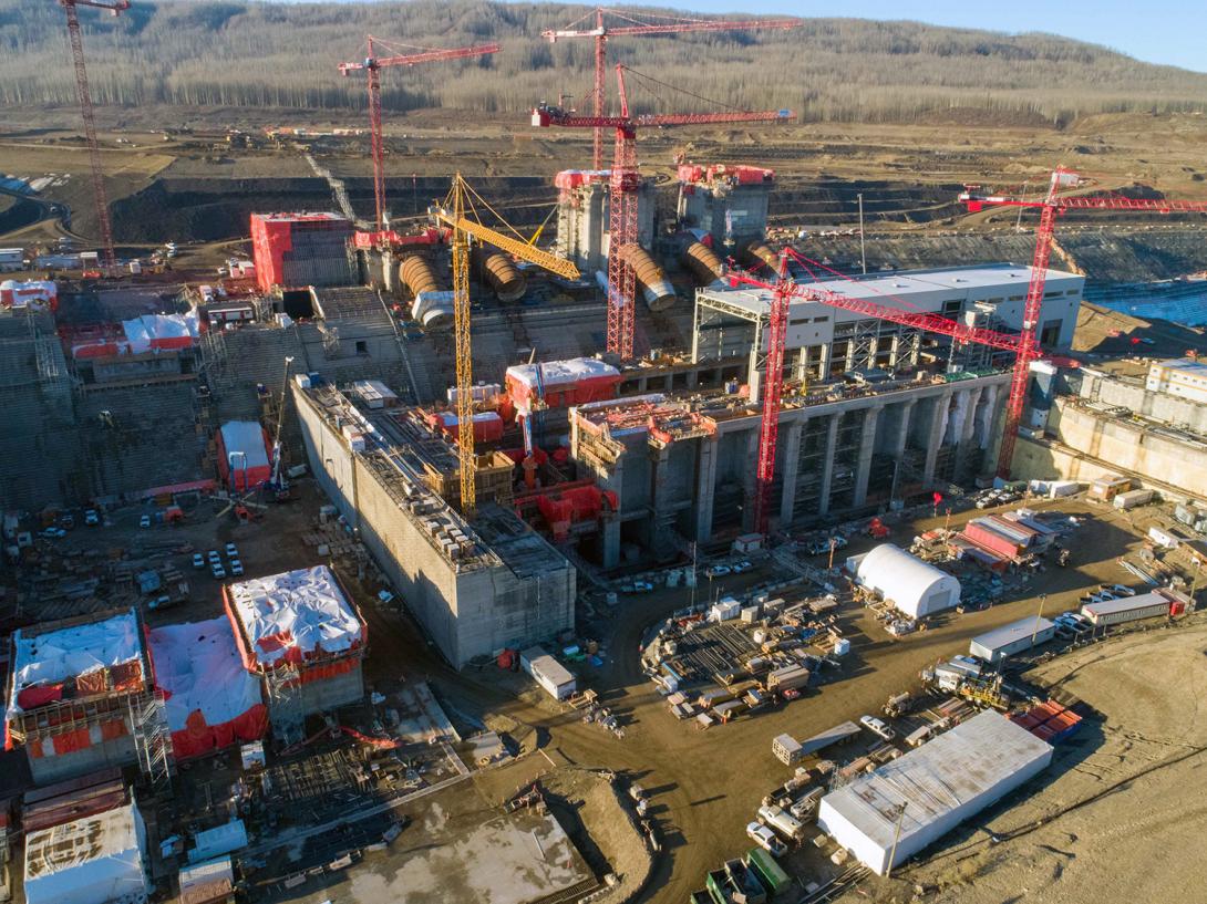 Up to nine cranes are being used to build the Site C powerhouse and install the six penstocks. | October 2020
