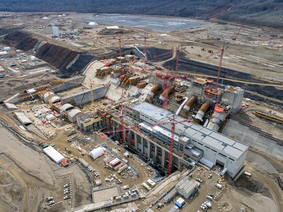 An overview of the Site C right bank structures, including the spillways, stilling basins, intakes, penstocks and the powerhouse. | April 2021