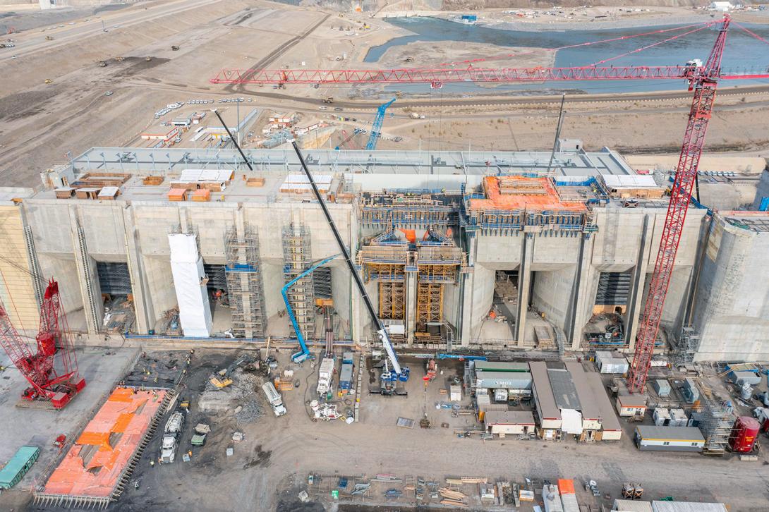 North-facing view of the six intake units, as crews work on finishing concrete on units 4 and 5. | October 2022